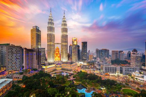 City shot of Kuala Lumpur, including a view of the Petronas Towers.